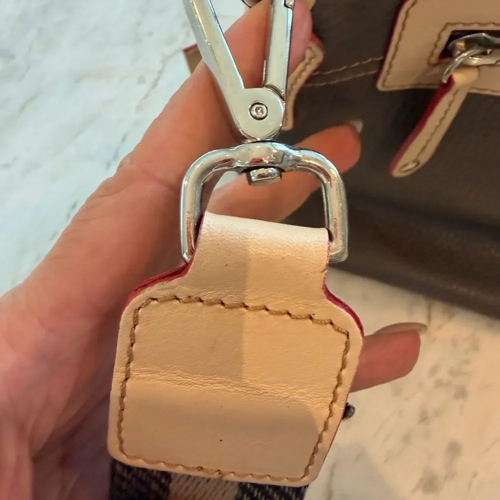 Grey Leather crossbody bag with Cream Handles and Red piping across the lining